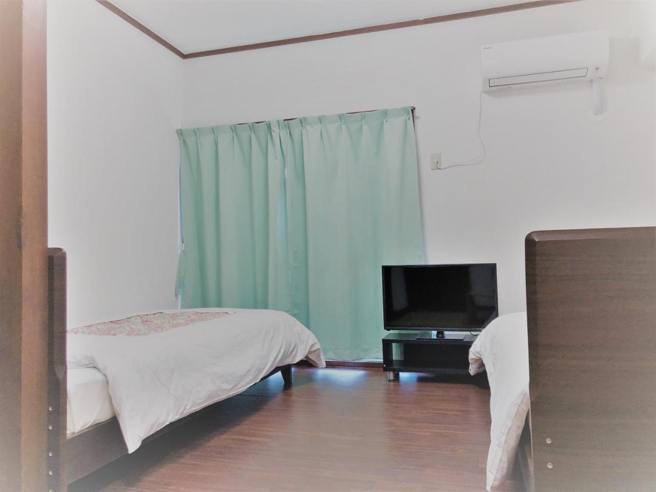 Sunset Hills Inn Naha Kültér fotó