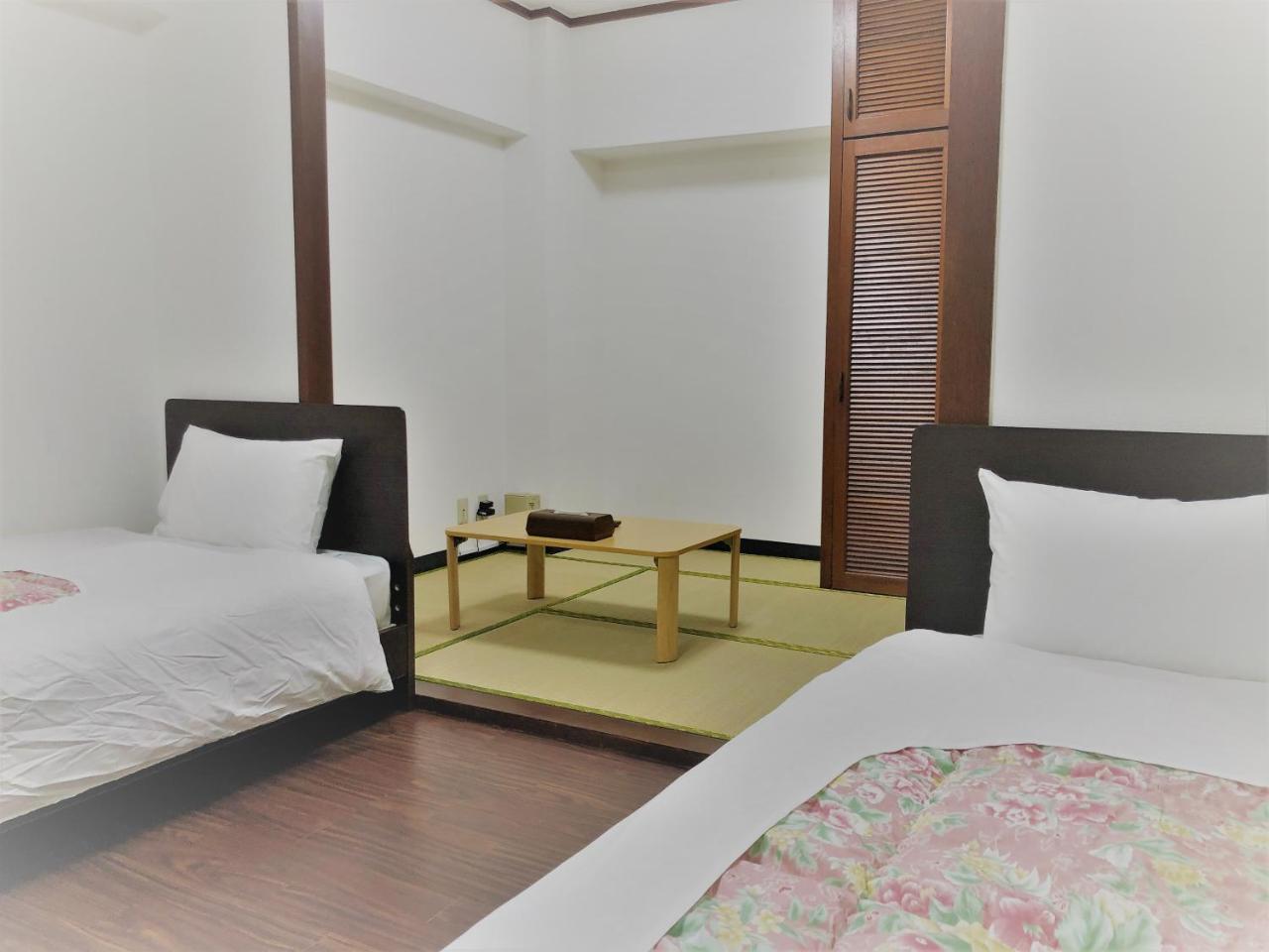 Sunset Hills Inn Naha Kültér fotó